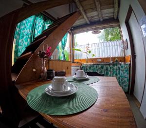 Posezení v ubytování Chalé Bonito Pousada em Paraty - Acomodações Privativas e Completas - Natureza - Wi-fi - TV - Garagem