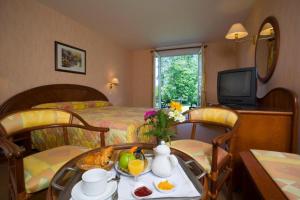 Φωτογραφία από το άλμπουμ του Logis Hôtel du Pont Neuf σε Le Veurdre