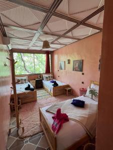 Letto o letti in una camera di Riad Atlas Garden