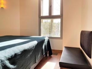 Ein Bett oder Betten in einem Zimmer der Unterkunft Wasserturm Spreewitz