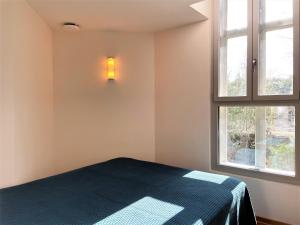 Ein Bett oder Betten in einem Zimmer der Unterkunft Wasserturm Spreewitz