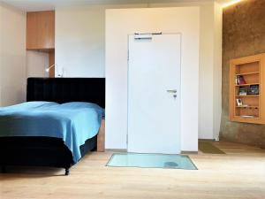 Ein Bett oder Betten in einem Zimmer der Unterkunft Wasserturm Spreewitz