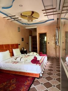 Letto o letti in una camera di Riad Atlas Garden