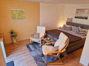 En eller flere senge i et værelse på Ferienwohnung "Christina"