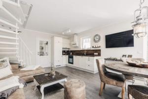 Kuchyň nebo kuchyňský kout v ubytování Meerschönheit + 28 fotografií