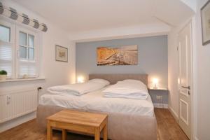 En eller flere senge i et værelse på Witthüs, Whg 1 + 10 billeder