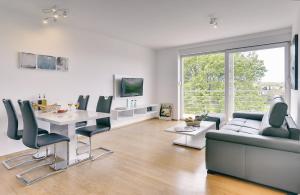 TV a/nebo společenská místnost v ubytování Apartments Vea