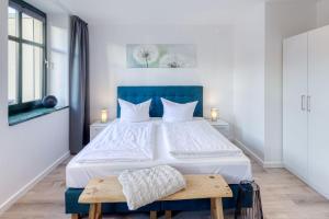 Postel nebo postele na pokoji v ubytování Haus Diana - Blaumeise