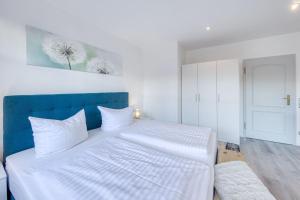 Postel nebo postele na pokoji v ubytování Haus Diana - Blaumeise