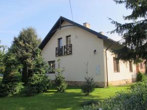Κήπος έξω από το Dom nad rzeką Wartą