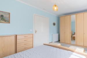 Ένα ή περισσότερα κρεβάτια σε δωμάτιο στο Ferienhaus Lieku