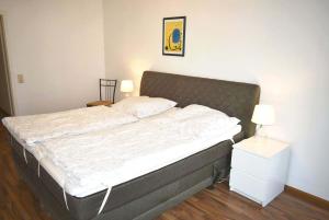 Ένα ή περισσότερα κρεβάτια σε δωμάτιο στο Haus Heß Ferienwohnung Nr 07 +12 φωτογραφίες