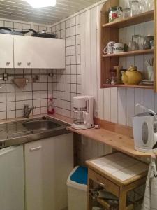Kuchyň nebo kuchyňský kout v ubytování Gemütliche Ferienwohnung Löbert