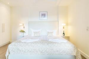 Ένα ή περισσότερα κρεβάτια σε δωμάτιο στο Villa Gruner App 10