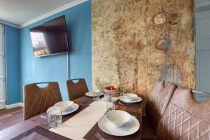 Μια τηλεόραση ή/και κέντρο ψυχαγωγίας στο Haus Mühlenstraße 8, App 7MSOG2 +20 φωτογραφίες
