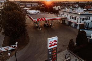 an aiya gas station with a sign in front of it at HOTEL AVIA Ekotrans in Piotrków Trybunalski