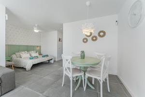 En eller flere senge i et værelse på Green Home 423 Golf del Sur + 8 billeder