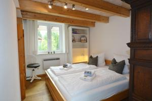 Postel nebo postele na pokoji v ubytování Schneckenhaus + 13 fotografií