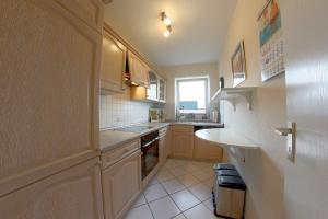 Kuchyň nebo kuchyňský kout v ubytování FW2 Deichperle + 8 fotografií