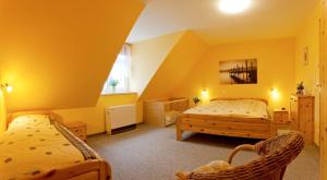 Ένα ή περισσότερα κρεβάτια σε δωμάτιο στο Trassenheide, Ferienhaus Teuber II +5 φωτογραφίες