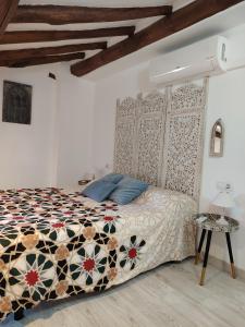 Postel nebo postele na pokoji v ubytování Alma Mudéjar Casa Rural