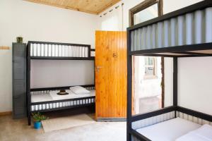 Кровать или кровати в номере CURIOCITY Backpackers Johannesburg
