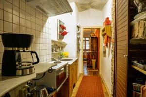 a kitchen with a sink and a stove top oven at Alte Seilerei in Görlitz