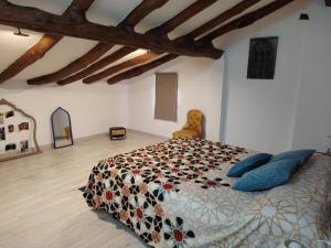 Postel nebo postele na pokoji v ubytování Alma Mudéjar Casa Rural