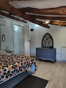 Postel nebo postele na pokoji v ubytování Alma Mudéjar Casa Rural