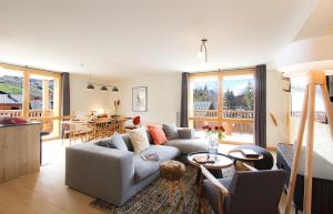 Posezení v ubytování Résidence Neige et Soleil by Leavetown Vacations