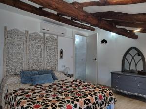 Postel nebo postele na pokoji v ubytování Alma Mudéjar Casa Rural