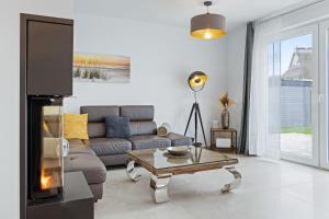 Χώρος καθιστικού στο Haus Strandsegler unter Reet OFC 30