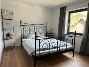 Posteľ alebo postele v izbe v ubytovaní Ferienwohnung Seestern-Mondsee
