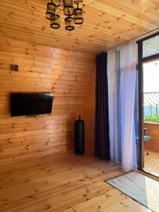 TV a/nebo společenská místnost v ubytování Marsi + 7 fotografií