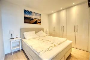 Ein Bett oder Betten in einem Zimmer der Unterkunft Ferienpark - Haus C, App 0C1109