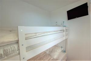 Ein Bett oder Betten in einem Zimmer der Unterkunft Ferienpark - Haus C, App 0C1109