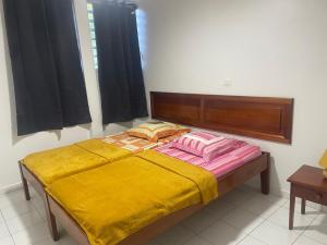 Postel nebo postele na pokoji v ubytování Appartement vue paradisiaque