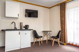 Køkken eller tekøkken på Dom Wypoczynkowy NATALIA