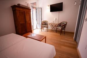 Postel nebo postele na pokoji v ubytování la Perla Casa Rural sostenible