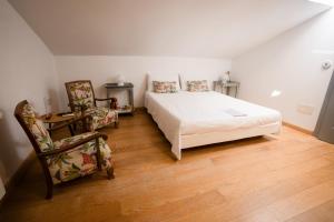 Postel nebo postele na pokoji v ubytování la Perla Casa Rural sostenible + 31 fotografií