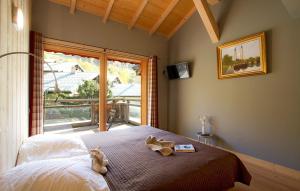 Postel nebo postele na pokoji v ubytování Chalet Gilda by Leavetown Vacations