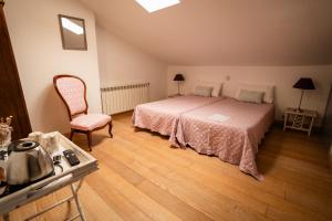 Postel nebo postele na pokoji v ubytování la Perla Casa Rural sostenible
