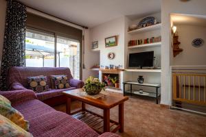 Χώρος καθιστικού στο AT040 Casa con piscina comunitaria a 10 min de la playa natural Els Muntanyans