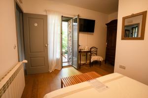 Postel nebo postele na pokoji v ubytování la Perla Casa Rural sostenible