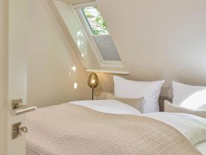Ένα ή περισσότερα κρεβάτια σε δωμάτιο στο Appartement Amsel +8 φωτογραφίες