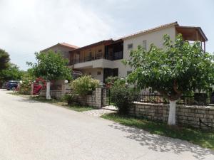 a house on the side of a road at Villa Fotis in Ligia