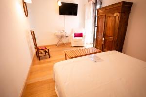 Postel nebo postele na pokoji v ubytování la Perla Casa Rural sostenible