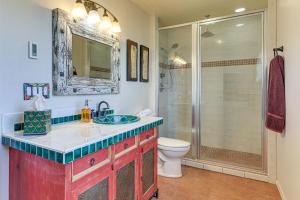 a bathroom with a toilet and a sink and a shower at Panoramic Vistas and Pergola Silver City Escape! in Silver City +19 photos