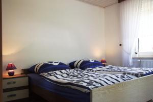 Ένα ή περισσότερα κρεβάτια σε δωμάτιο στο Ferienhaus Annegrete