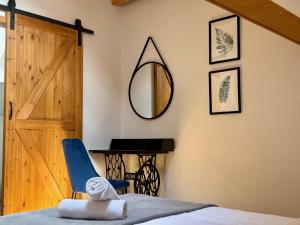 Posteľ alebo postele v izbe v ubytovaní Maya Pokoje i Apartamenty